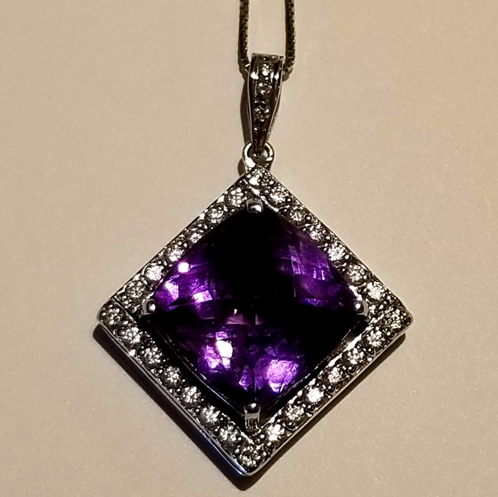 12 ct Amethyst and diamond pendant and chain